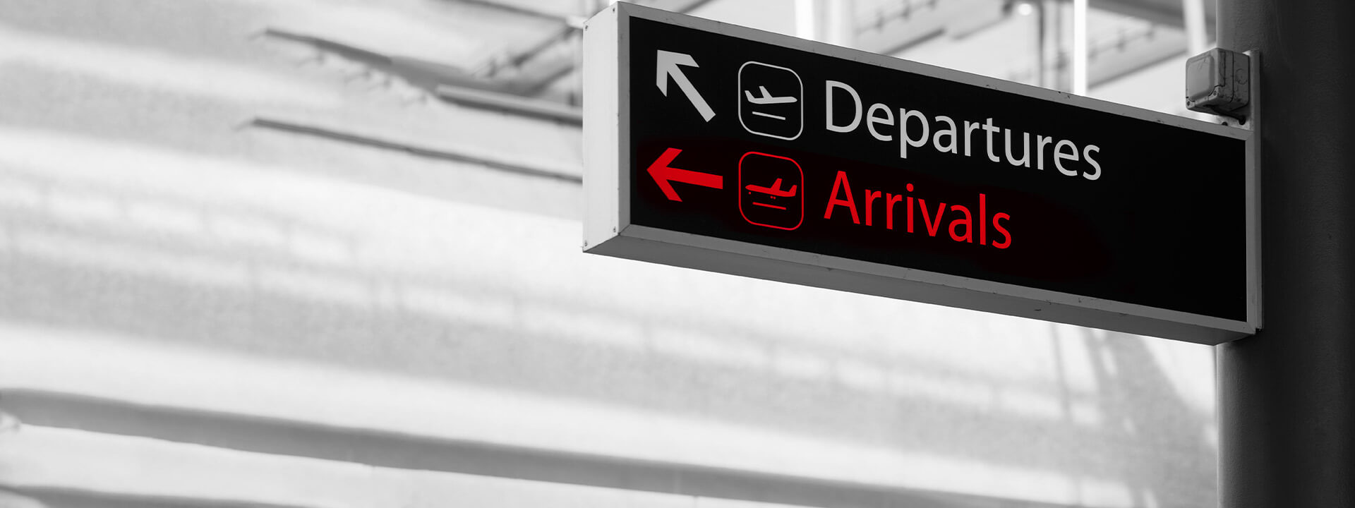 departure and arrival sign at airport